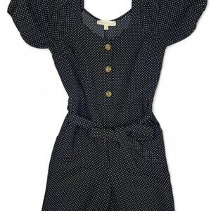 Navy blue and white polka dot romper with button-up front and elastic waistband